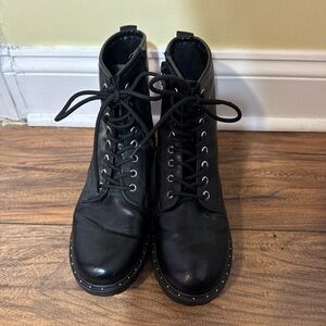 Black combat zip up boots with silver pearl lining